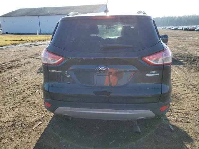 Photo 6 from auction – 2014 FORD ESCAPE SE with VIN 1FMCU0GX2EUB25677