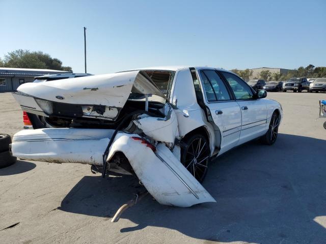 Photo 3 from auction – 1999 FORD CROWN VICT with VIN 2FAFP74W9XX143429