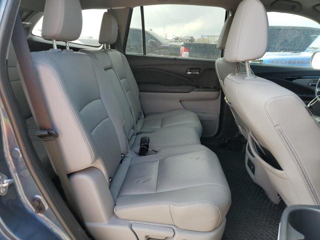 Photo 11 from auction – 2019 HONDA PILOT TOUR with VIN 5FNYF5H90KB013563