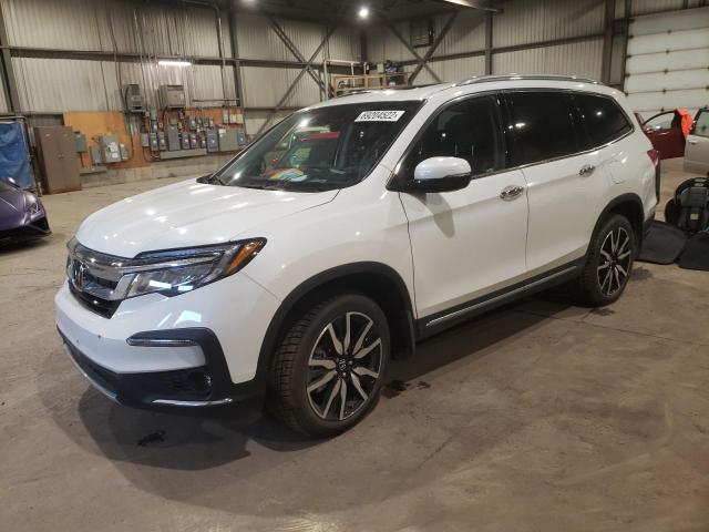 HONDA PILOT TOUR 2021 with VIN 5FNYF6H94MB503299 - Photo from auction