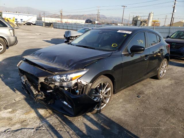 MAZDA 3 TOURING 2018 with VIN 3MZBN1L34JM261634 - Photo from auction