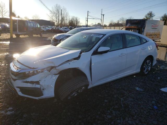 HONDA CIVIC LX 2018 with VIN 19XFC2F50JE209134 - Photo from auction