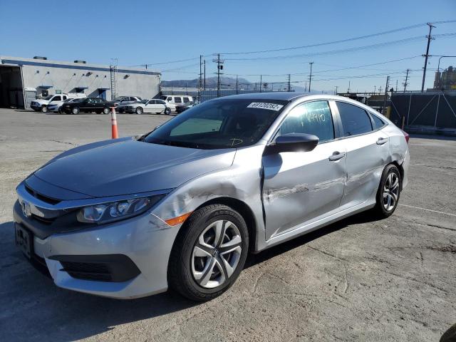 HONDA CIVIC LX 2018 with VIN 2HGFC2F50JH606977 - Photo from auction