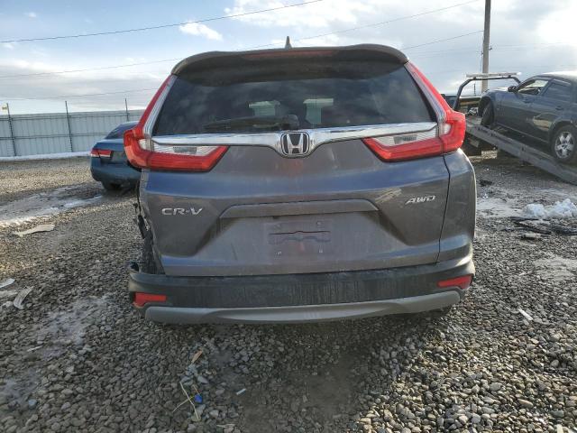 Photo 6 from auction – 2018 HONDA CR-V EX with VIN 7FARW2H51JE103162