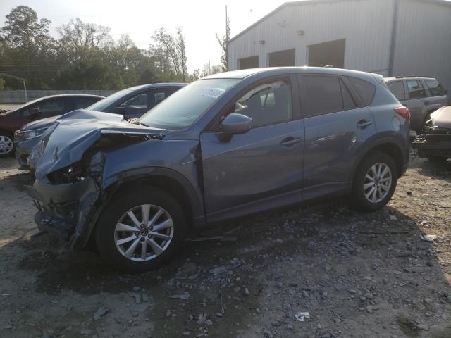 MAZDA CX-5 TOURI 2015 with VIN JM3KE2CYXF0438208 - Photo from auction