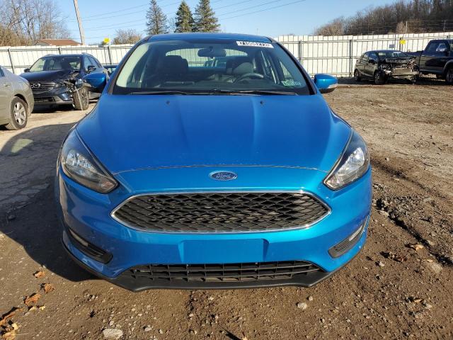 Photo 5 from auction – 2015 FORD FOCUS SE with VIN 1FADP3F29FL274057