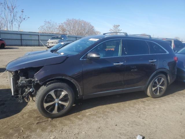 KIA SORENTO EX 2016 with VIN 5XYPH4A53GG041395 - Photo from auction