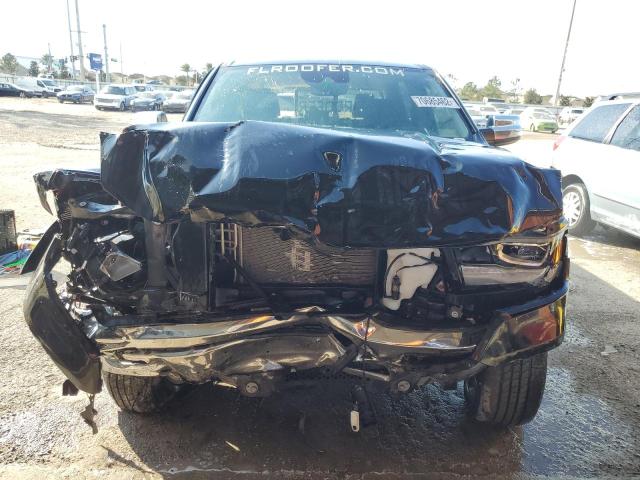 Photo 5 from auction – 2021 RAM 1500 LARAM with VIN 1C6SRFJTXMN795777