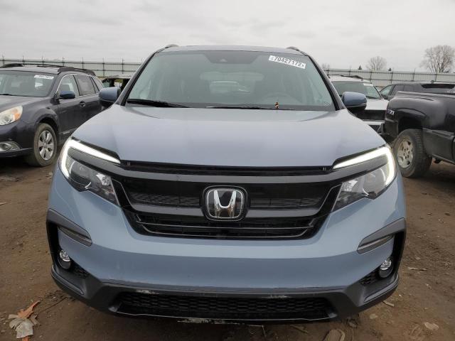 Photo 5 from auction – 2022 HONDA PILOT SE with VIN 5FNYF6H26NB056981