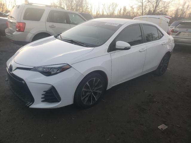 TOYOTA COROLLA L 2019 with VIN 5YFBURHE7KP910111 - Photo from auction