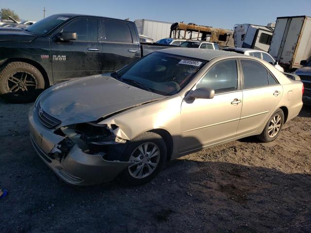 TOYOTA CAMRY LE 2004 with VIN 4T1BF32K04U584594 - Photo from auction