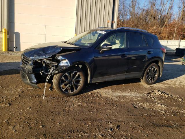 MAZDA CX-5 GT 2016 with VIN JM3KE4DY6G0865283 - Photo from auction