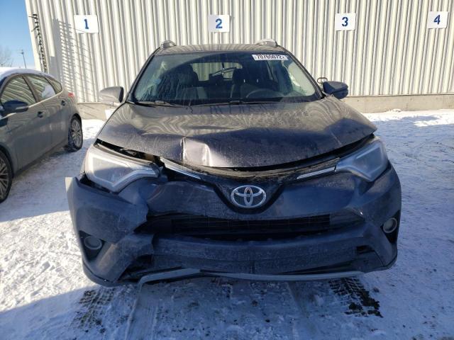 Photo 5 from auction – 2016 TOYOTA RAV4 XLE with VIN 2T3RFREV0GW458061