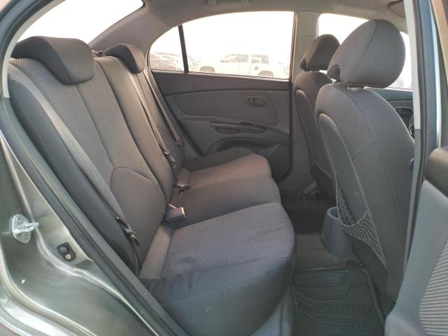 Photo 10 from auction – 2011 KIA RIO BASE with VIN KNADH4A30B6912554
