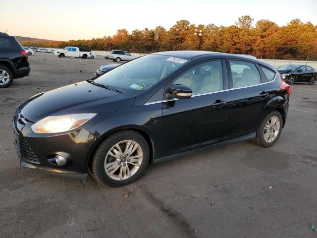 FORD FOCUS 2012 with VIN 1FAHP3M21CL281598 - Photo from auction