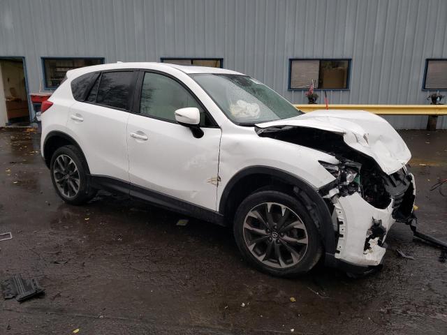 Photo 4 from auction – 2016 MAZDA CX-5 with VIN JM3KE2DY0G0656934