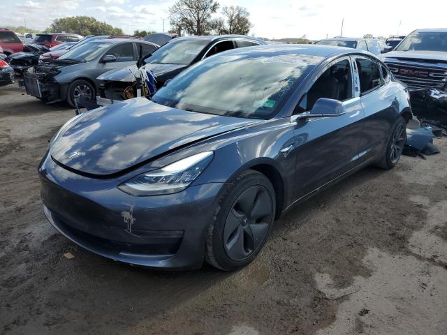 TESLA MODEL 3 2019 with VIN 5YJ3E1EB2KF477290 - Photo from auction