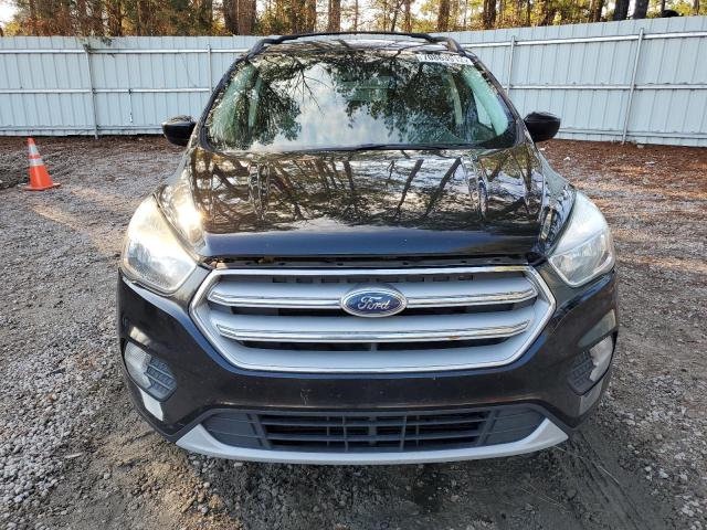 Photo 5 from auction – 2018 FORD ESCAPE SE with VIN 1FMCU0GD0JUA36710