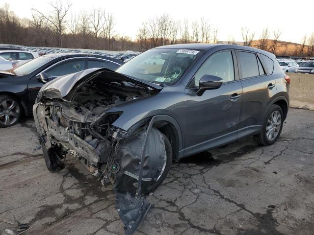MAZDA CX-5 GT 2015 with VIN JM3KE4DY7F0520911 - Photo from auction