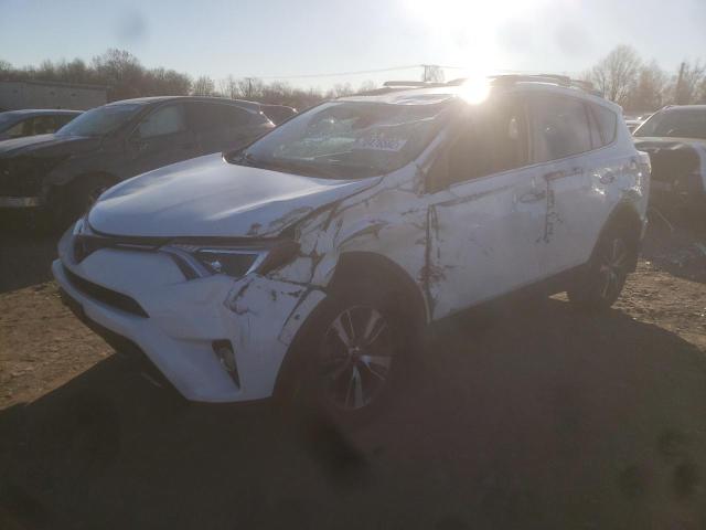 TOYOTA RAV4 ADVEN 2018 with VIN 2T3RFREV6JW810714 - Photo from auction