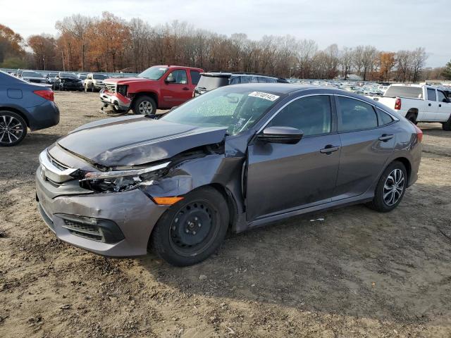 HONDA CIVIC LX 2018 with VIN 2HGFC2F53JH584408 - Photo from auction