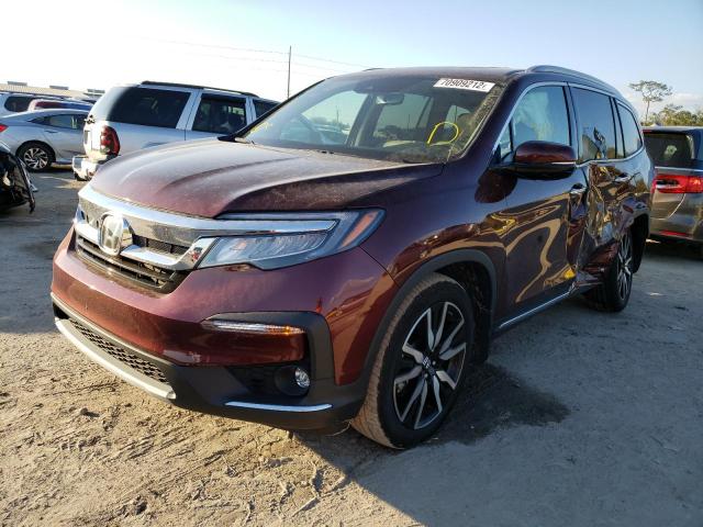 HONDA PILOT TOUR 2021 with VIN 5FNYF5H63MB029944 - Photo from auction