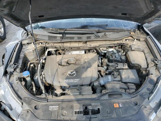 Photo 12 from auction – 2014 MAZDA CX-5 GT with VIN JM3KE2DY6E0370227