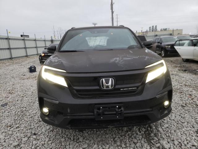 Photo 5 from auction – 2022 HONDA PILOT BLAC with VIN 5FNYF6H71NB072856