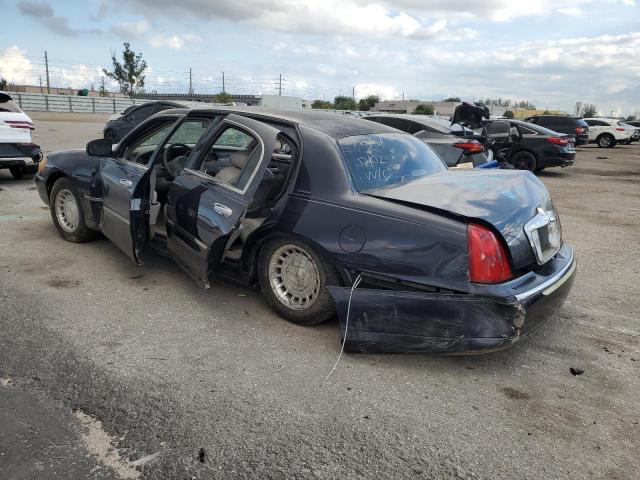 Photo 2 from auction – 2000 LINCOLN TOWN CAR E with VIN 1LNHM81W6YY828538