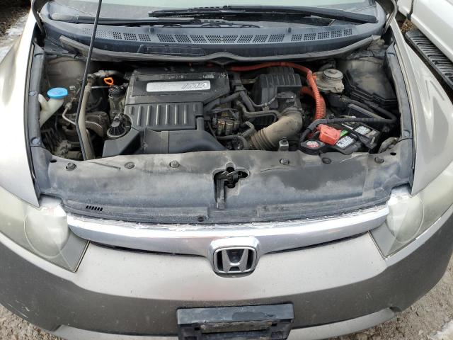 Photo 11 from auction – 2006 HONDA CIVIC HYBR with VIN JHMFA36246S002380