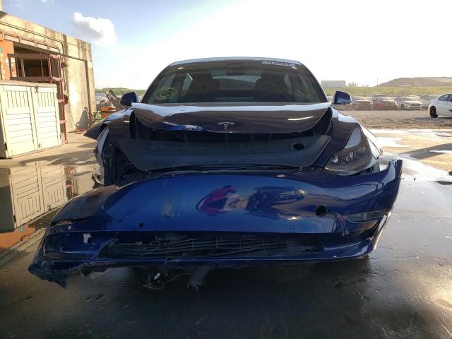 Photo 5 from auction – 2022 TESLA MODEL 3 with VIN 5YJ3E1EC4NF153240