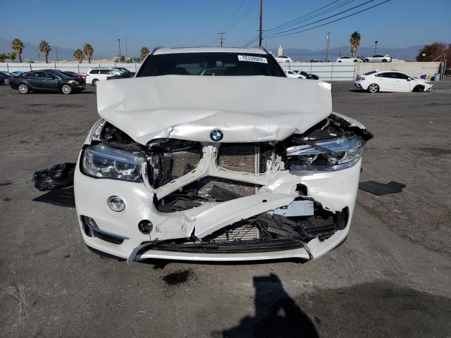 Photo 5 from auction – 2018 BMW X5 XDRIVE3 with VIN 5UXKR0C50J0Y04210
