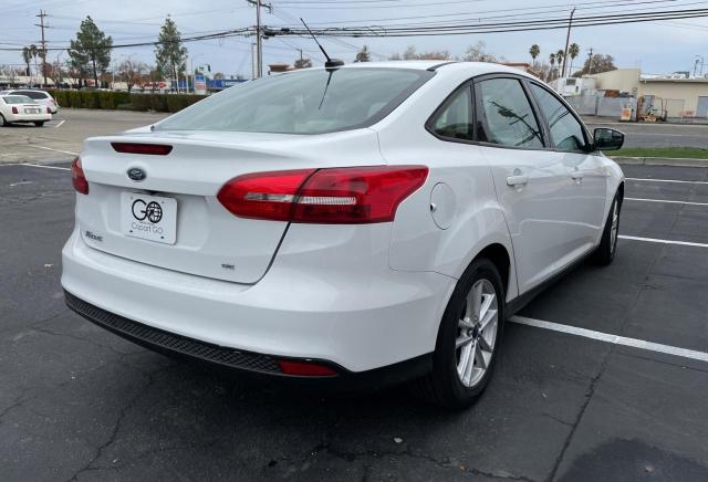 Photo 4 from auction – 2015 FORD FOCUS SE with VIN 1FADP3F29FL204543
