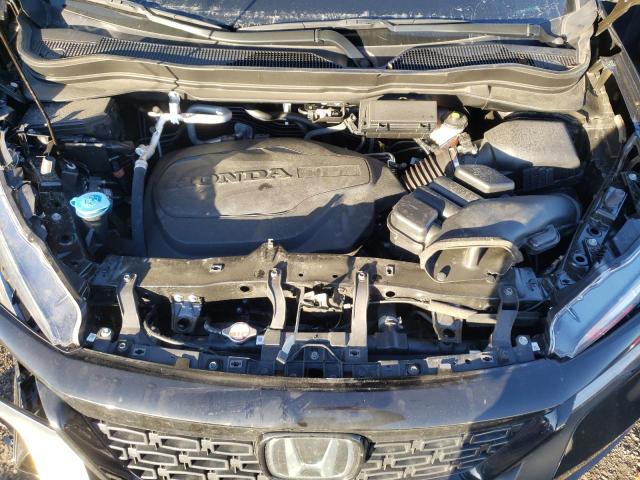 Photo 12 from auction – 2021 HONDA PASSPORT T with VIN 5FNYF8H99MB035386