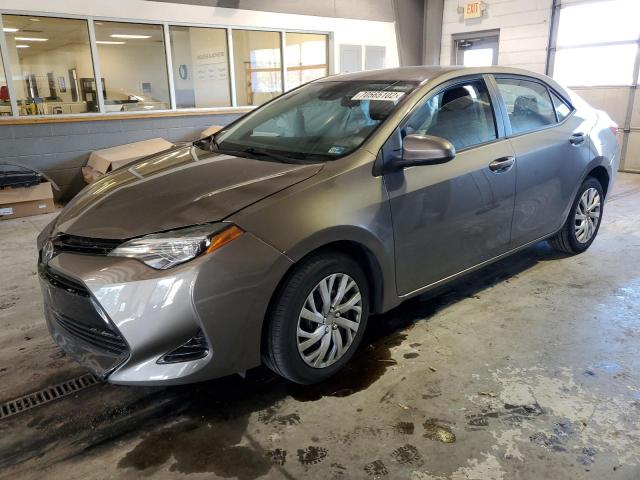 TOYOTA COROLLA L 2018 with VIN 5YFBURHE6JP773872 - Photo from auction