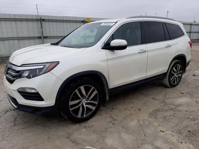 HONDA PILOT ELIT 2016 with VIN 5FNYF6H00GB112818 - Photo from auction