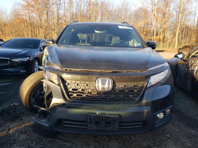 Photo 5 from auction – 2021 HONDA PASSPORT T with VIN 5FNYF8H99MB035386