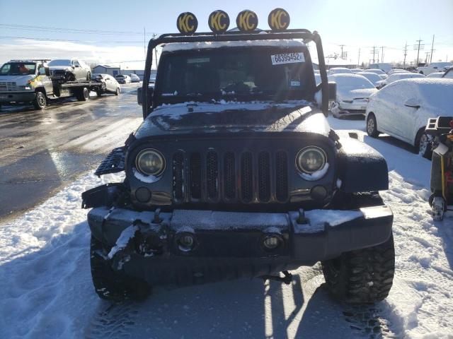 Photo 5 from auction – 2014 JEEP WRANGLER U with VIN 1C4BJWEG5EL165112