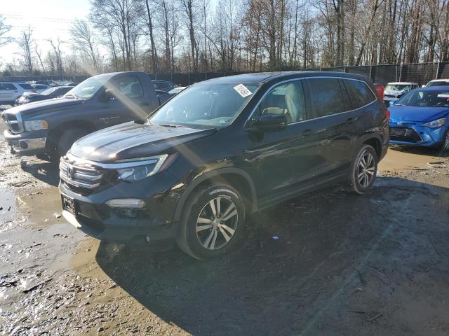 HONDA PILOT EXLN 2016 with VIN 5FNYF6H71GB106491 - Photo from auction