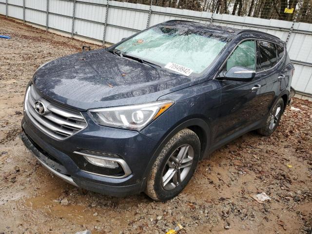 HYUNDAI SANTA FE S 2018 with VIN 5NMZU3LB7JH059381 - Photo from auction