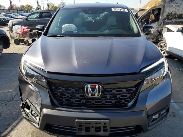 Photo 5 from auction – 2021 HONDA PASSPORT E with VIN 5FNYF7H55MB010394