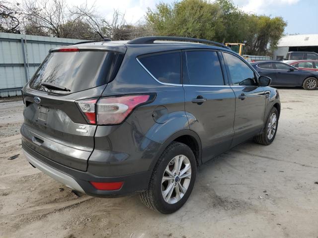 Photo 3 from auction – 2018 FORD ESCAPE SE with VIN 1FMCU0GD2JUB11309
