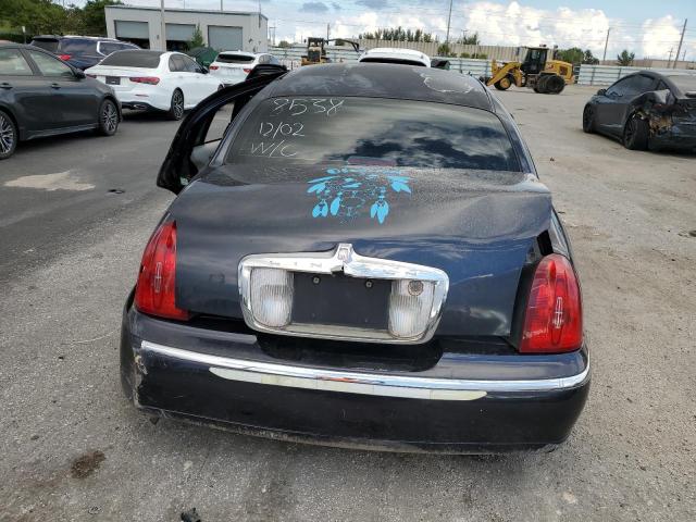 Photo 6 from auction – 2000 LINCOLN TOWN CAR E with VIN 1LNHM81W6YY828538