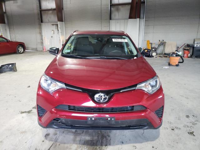 Photo 5 from auction – 2018 TOYOTA RAV4 LE with VIN 2T3BFREV3JW814236