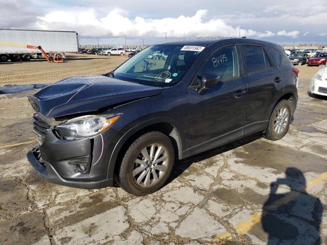MAZDA CX-5 TOURI 2016 with VIN JM3KE2CY4G0811759 - Photo from auction