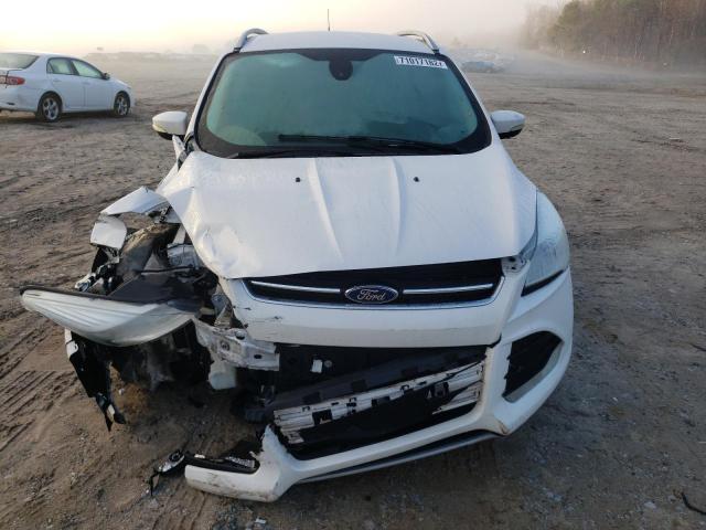 Photo 5 from auction – 2016 FORD ESCAPE TIT with VIN 1FMCU0JX3GUC19059