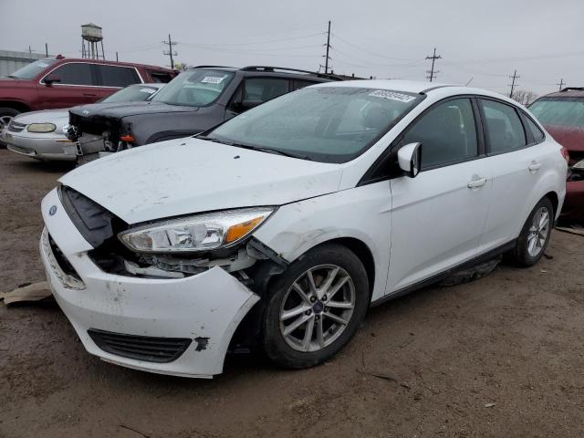 FORD FOCUS SE 2018 with VIN 1FADP3F24JL320063 - Photo from auction
