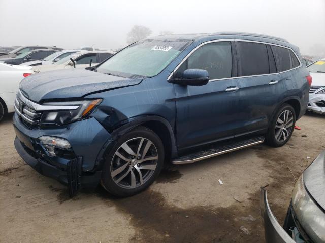 HONDA PILOT TOUR 2018 with VIN 5FNYF6H96JB031389 - Photo from auction