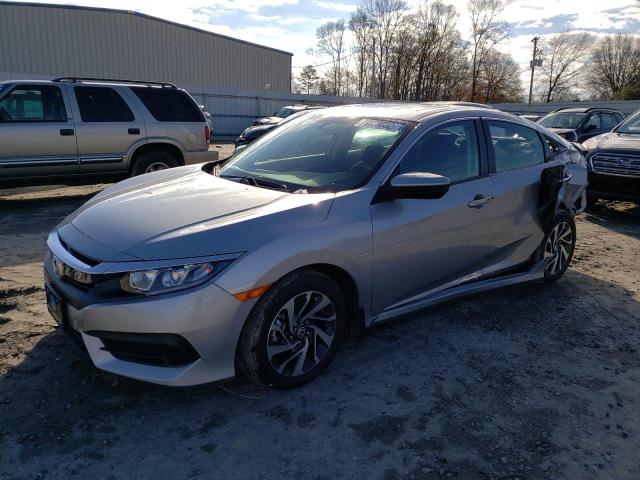 HONDA CIVIC EX 2018 with VIN 2HGFC2F74JH604375 - Photo from auction