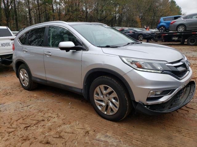 Photo 4 from auction – 2016 HONDA CR-V EXL with VIN 2HKRM3H71GH500051